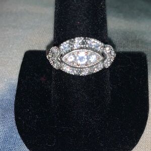 1950 gold princess cut ring with diamonds. It’s a timeless part of our heirloom.